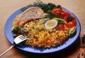 Vermicelli, noodles with pork steak boiled chicken egg on a blue plate Royalty Free Stock Photo